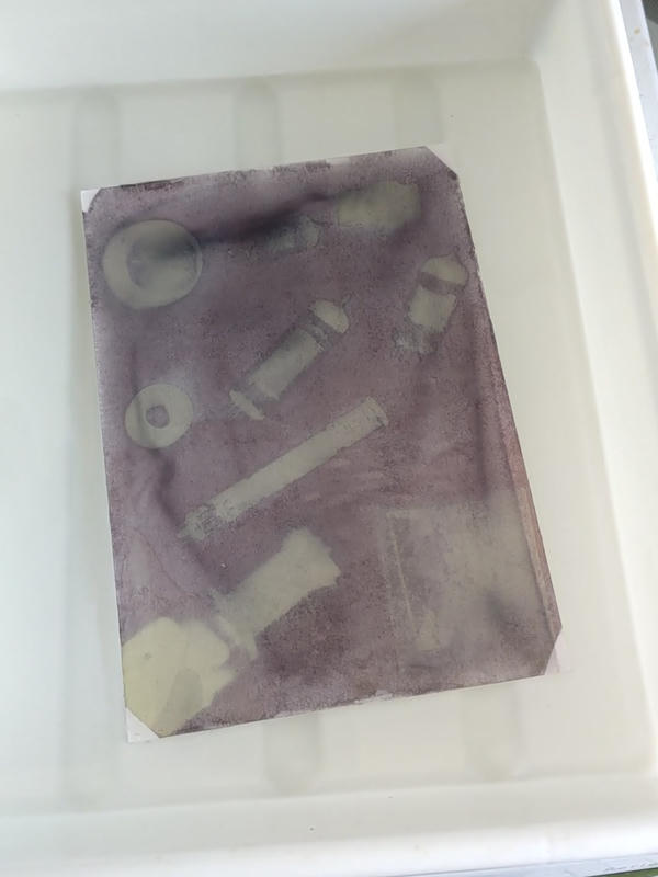 Start of development, exposed areas are quickly forming soluble dye