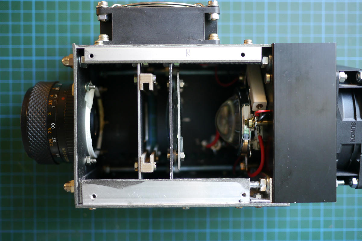 Inside of the Embiggener, showing the objective lens, film plane, condenser lens and LED light source