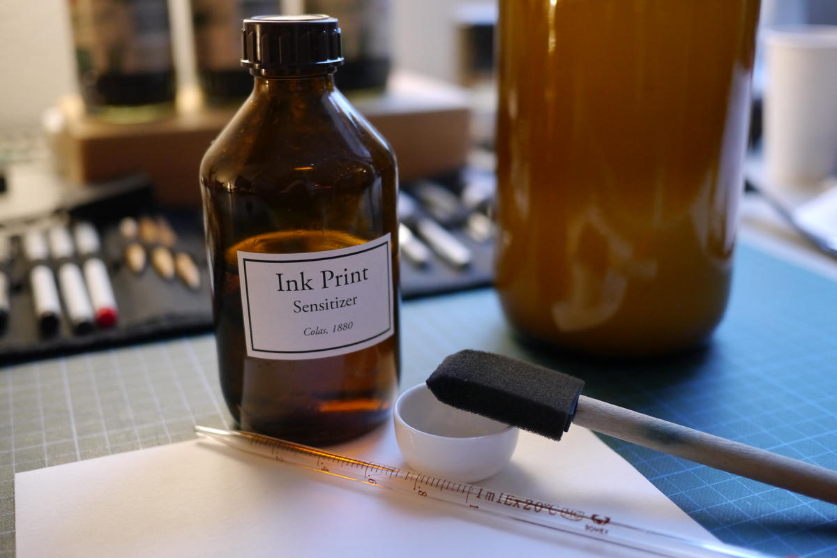 Bottle of prepared sensitizer, tastefully arranged on my desk